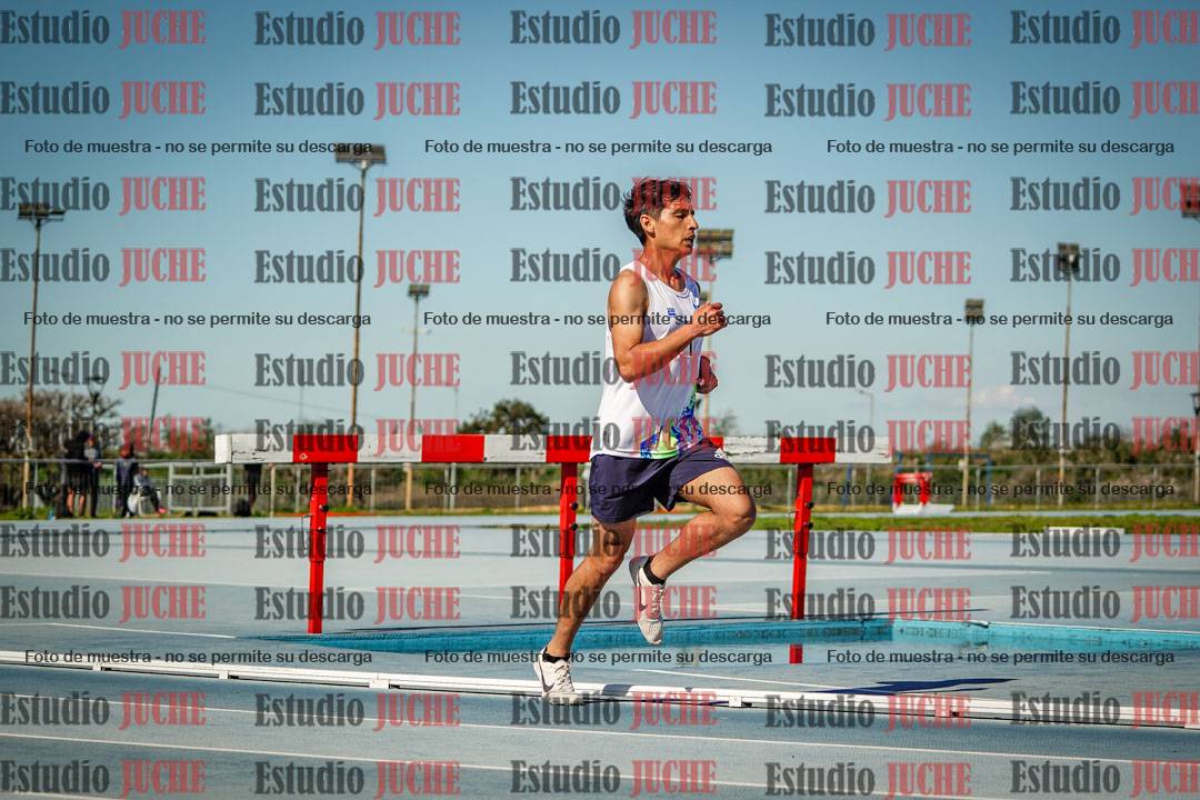 Fotos de los 5000 m llanos de mujeres y varones