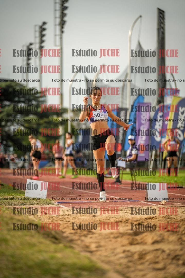 Fotos del salto en largo de mujeres