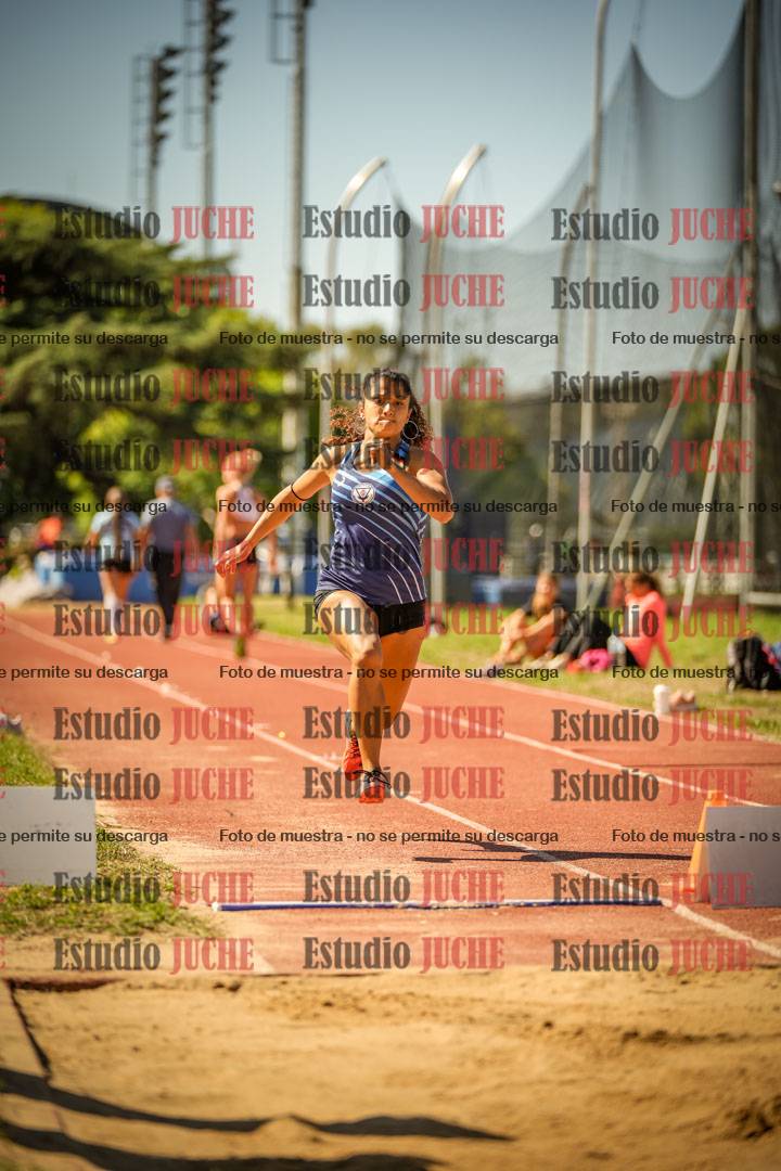 Fotos del salto en largo de mujeres