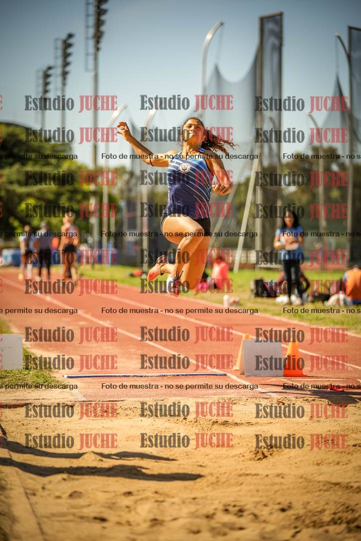 Fotos del salto en largo de mujeres