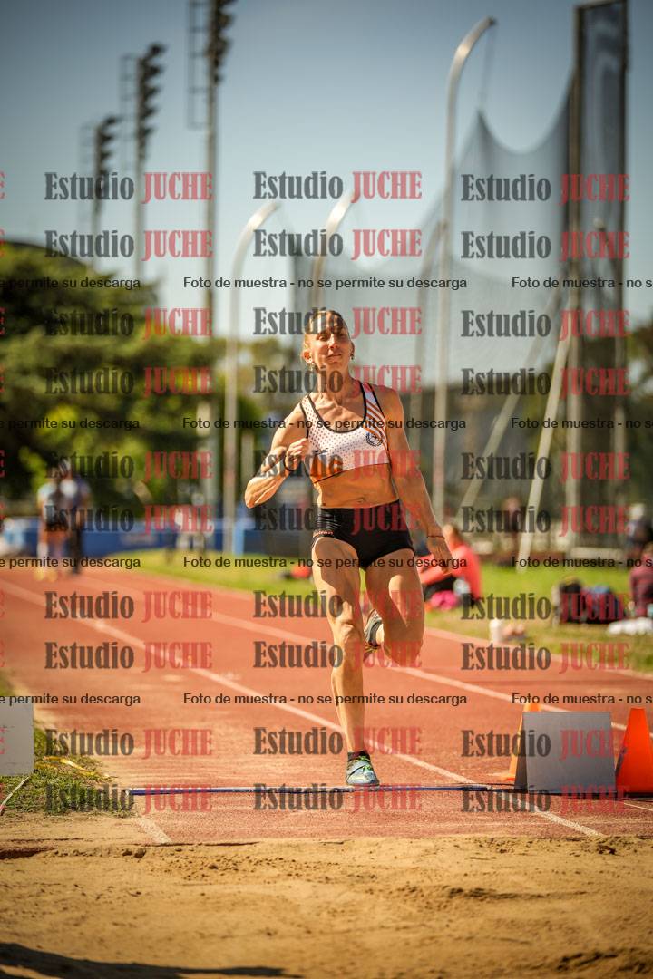 Fotos del salto en largo de mujeres