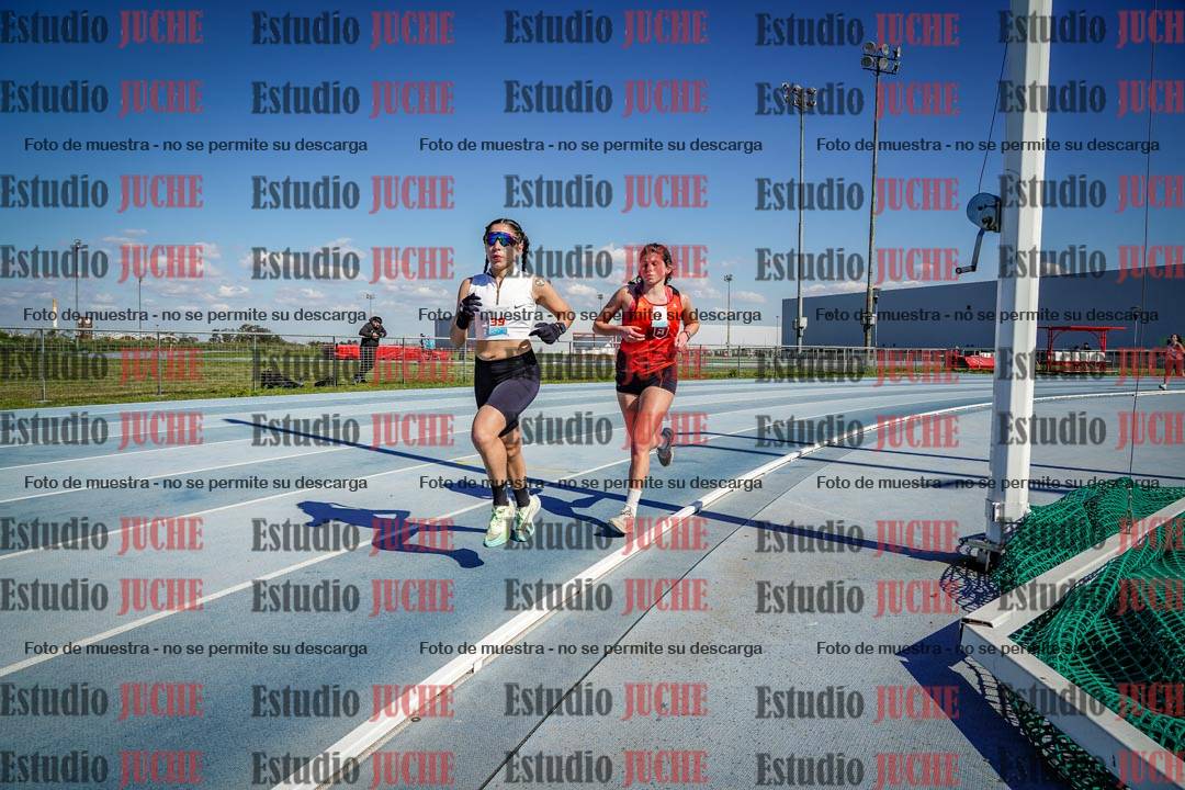 Fotos de los 5000 m llanos de mujeres y varones