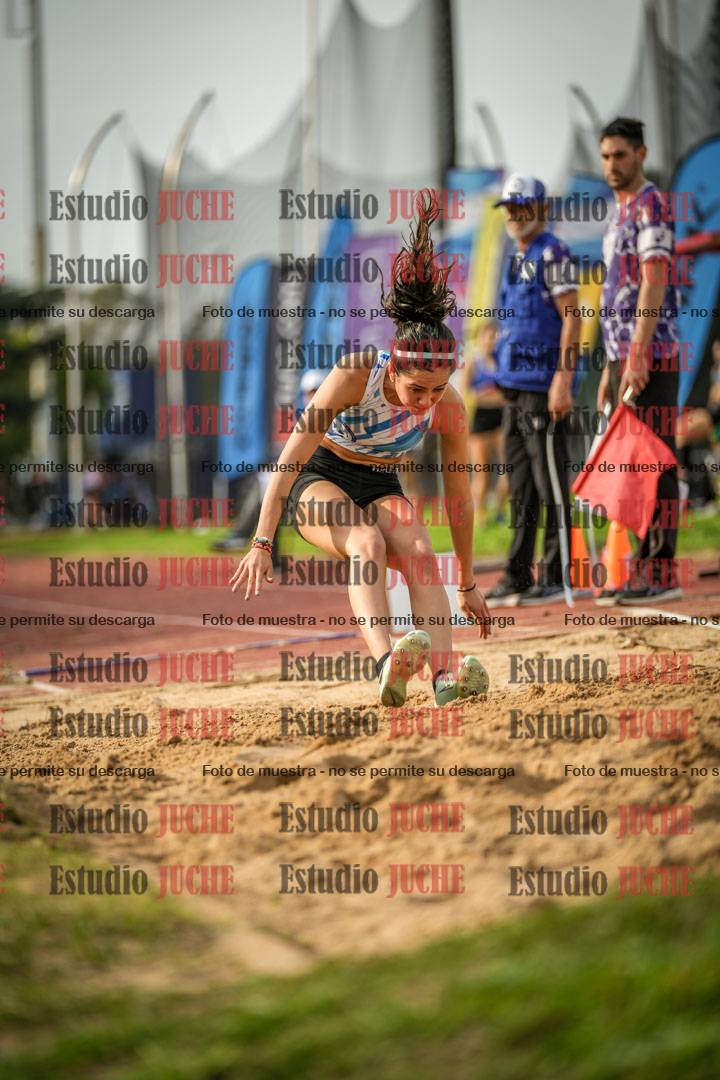 Fotos del salto en largo de mujeres