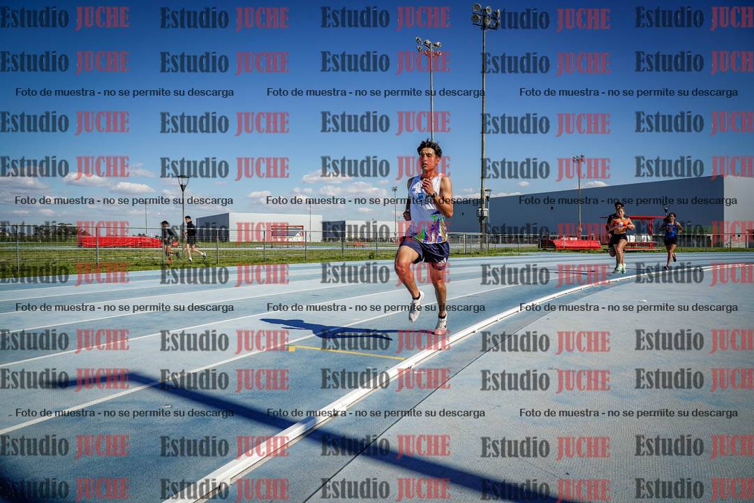 Fotos de los 5000 m llanos de mujeres y varones