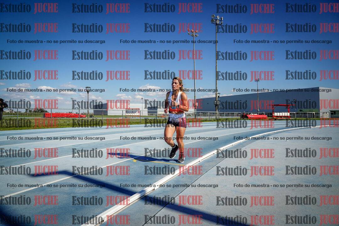 Fotos de los 5000 m llanos de mujeres y varones