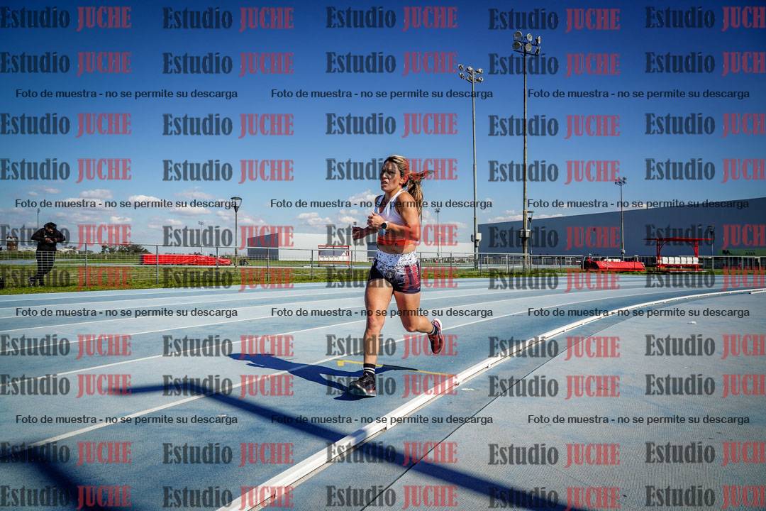 Fotos de los 5000 m llanos de mujeres y varones