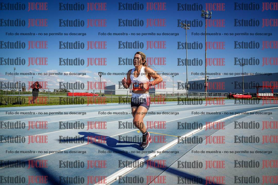 Fotos de los 5000 m llanos de mujeres y varones