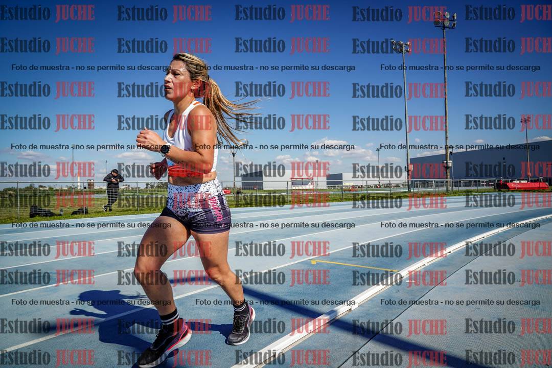 Fotos de los 5000 m llanos de mujeres y varones