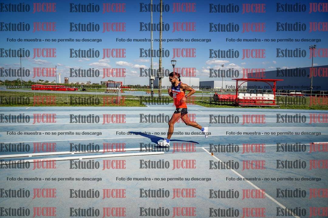 Fotos de los 5000 m llanos de mujeres y varones