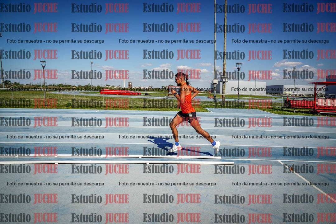 Fotos de los 5000 m llanos de mujeres y varones