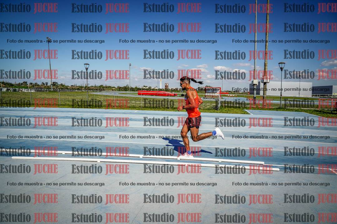 Fotos de los 5000 m llanos de mujeres y varones