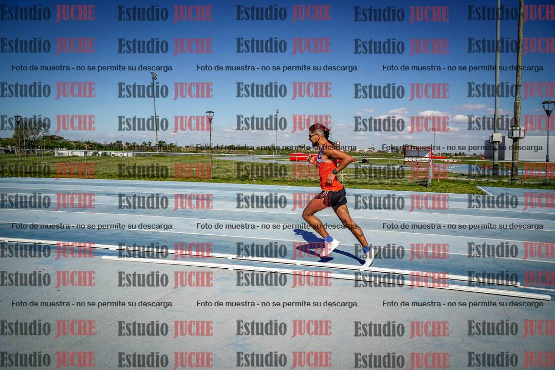 Fotos de los 5000 m llanos de mujeres y varones