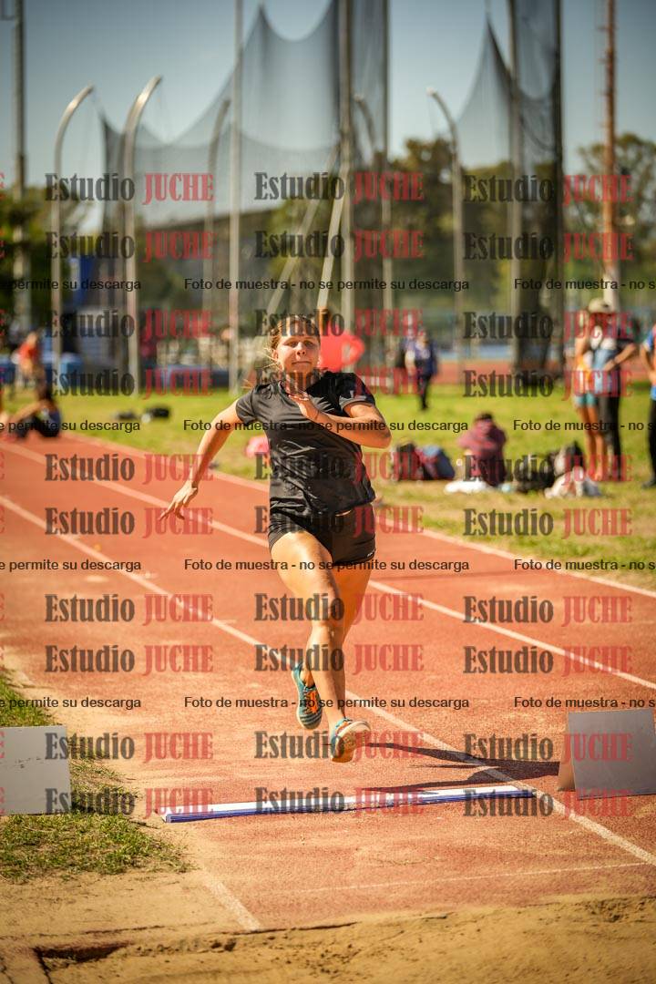 Fotos del salto en largo de mujeres