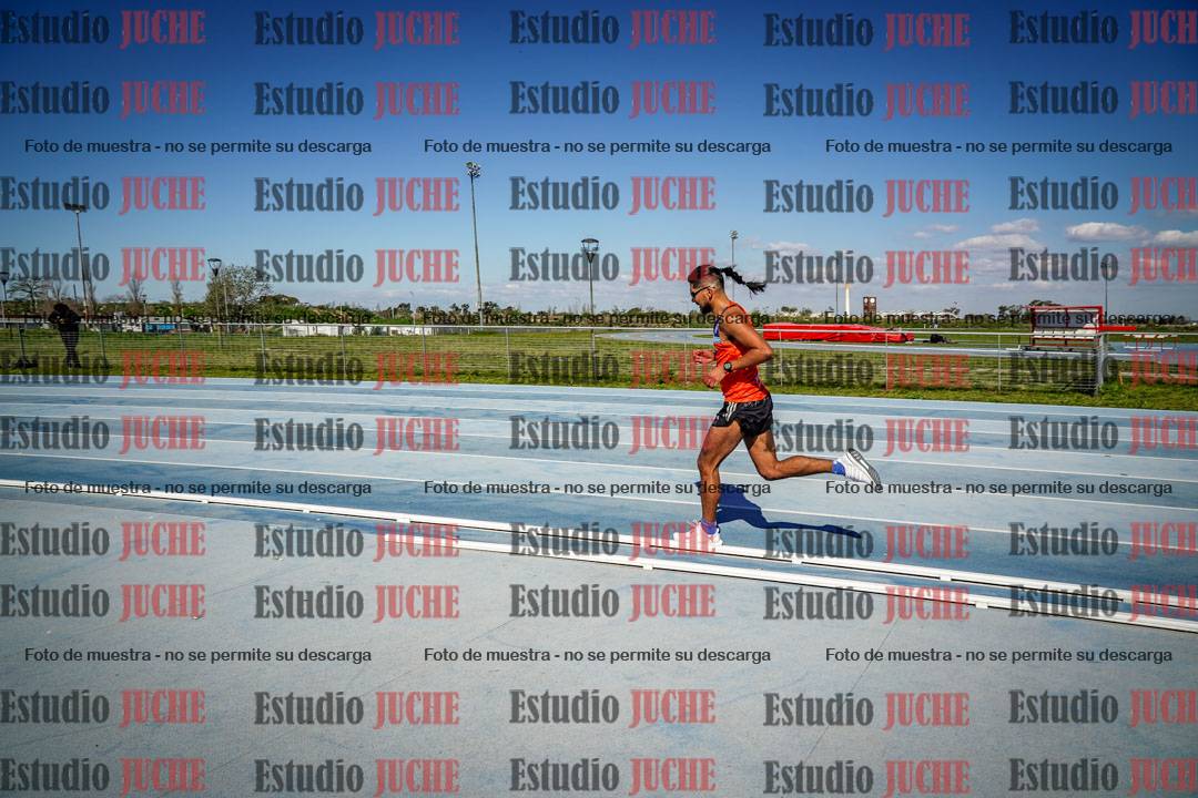 Fotos de los 5000 m llanos de mujeres y varones