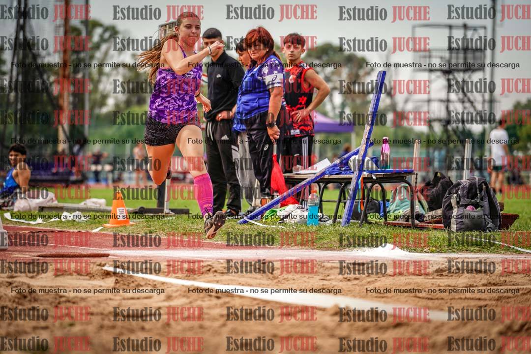 Fotos del salto triple de mujeres y varones