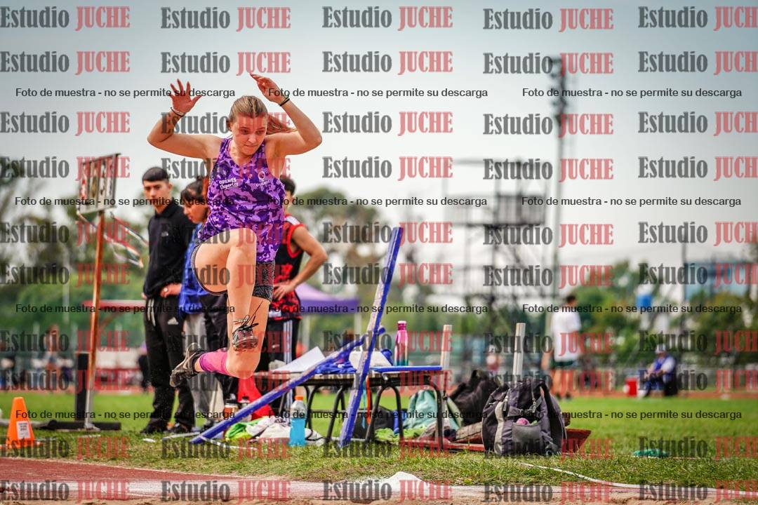 Fotos del salto triple de mujeres y varones