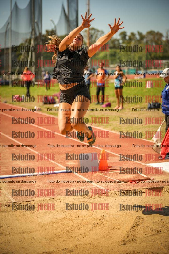 Fotos del salto en largo de mujeres