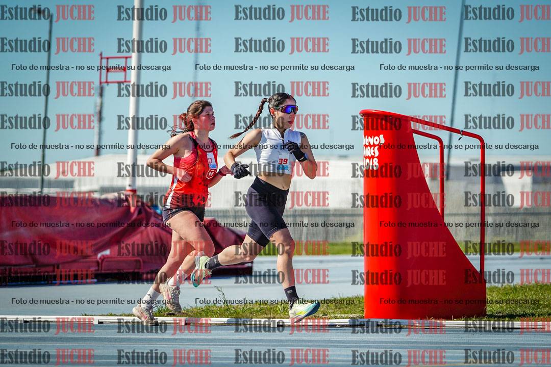 Fotos de los 5000 m llanos de mujeres y varones