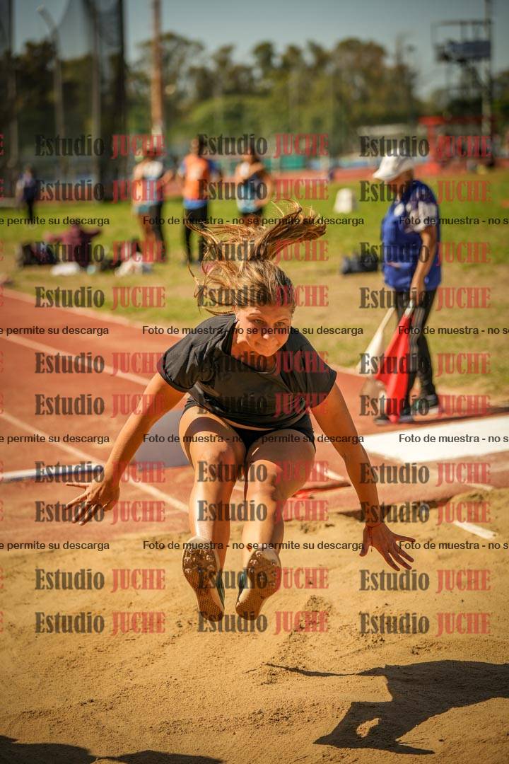 Fotos del salto en largo de mujeres