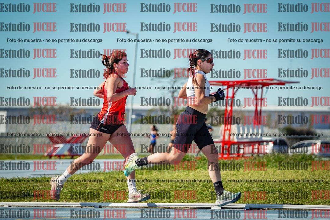 Fotos de los 5000 m llanos de mujeres y varones