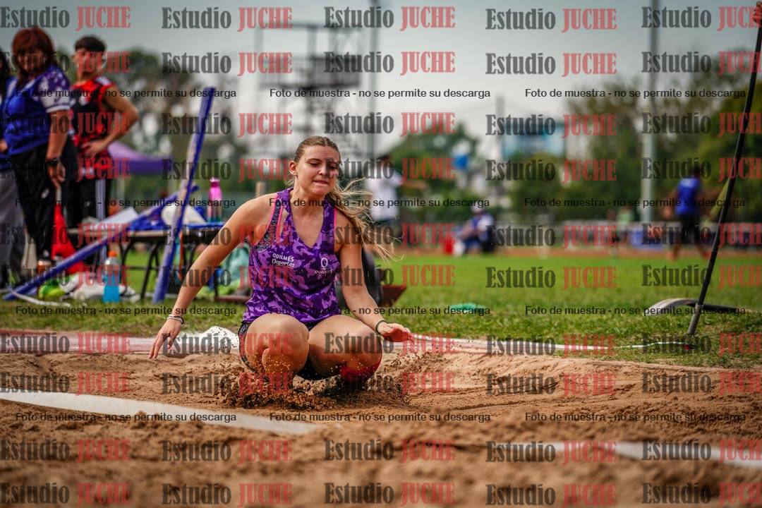 Fotos del salto triple de mujeres y varones