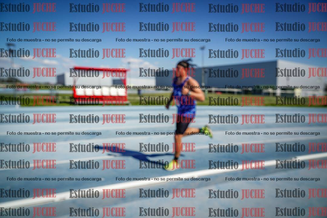 Fotos de los 5000 m llanos de mujeres y varones