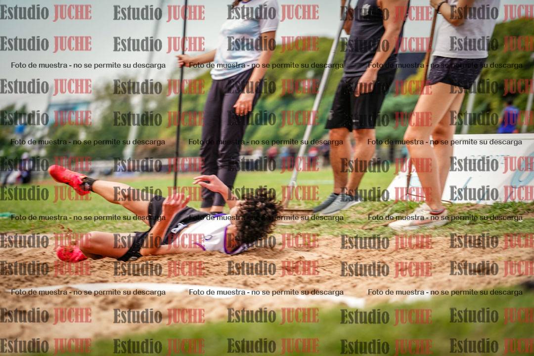 Fotos del salto triple de mujeres y varones