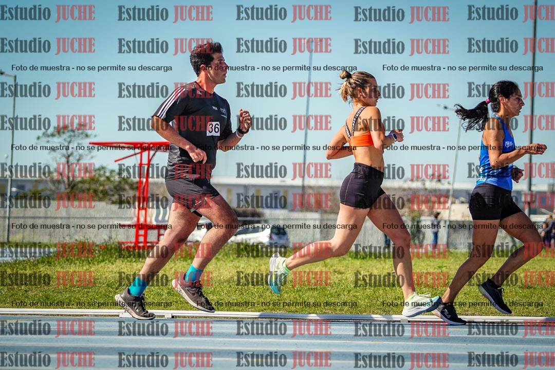 Fotos de los 5000 m llanos de mujeres y varones
