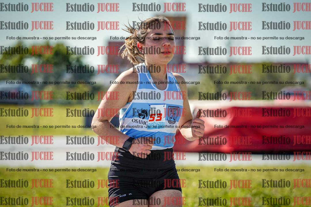 Fotos de los 5000 m llanos de mujeres y varones