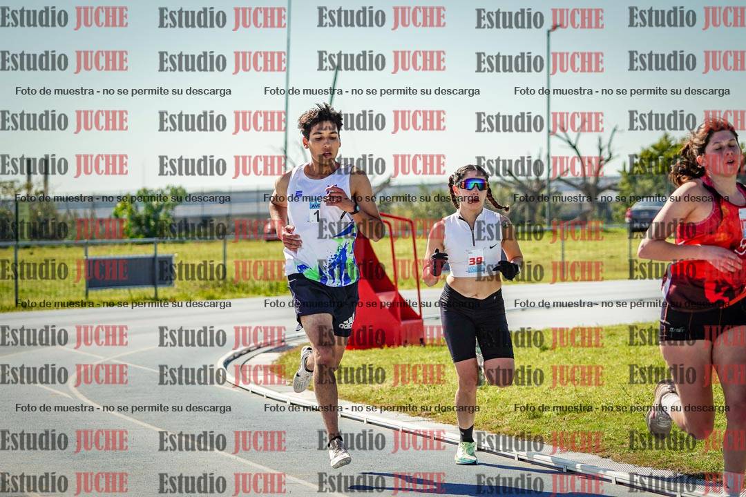 Fotos de los 5000 m llanos de mujeres y varones