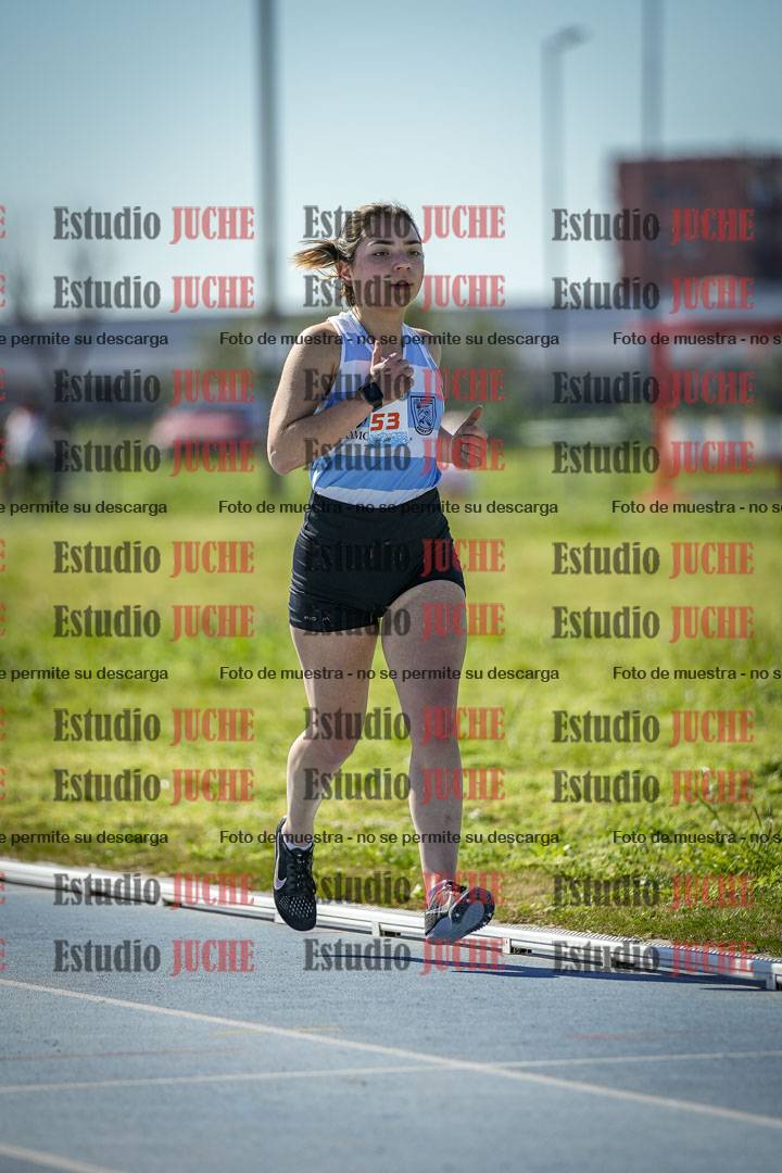 Fotos de los 5000 m llanos de mujeres y varones