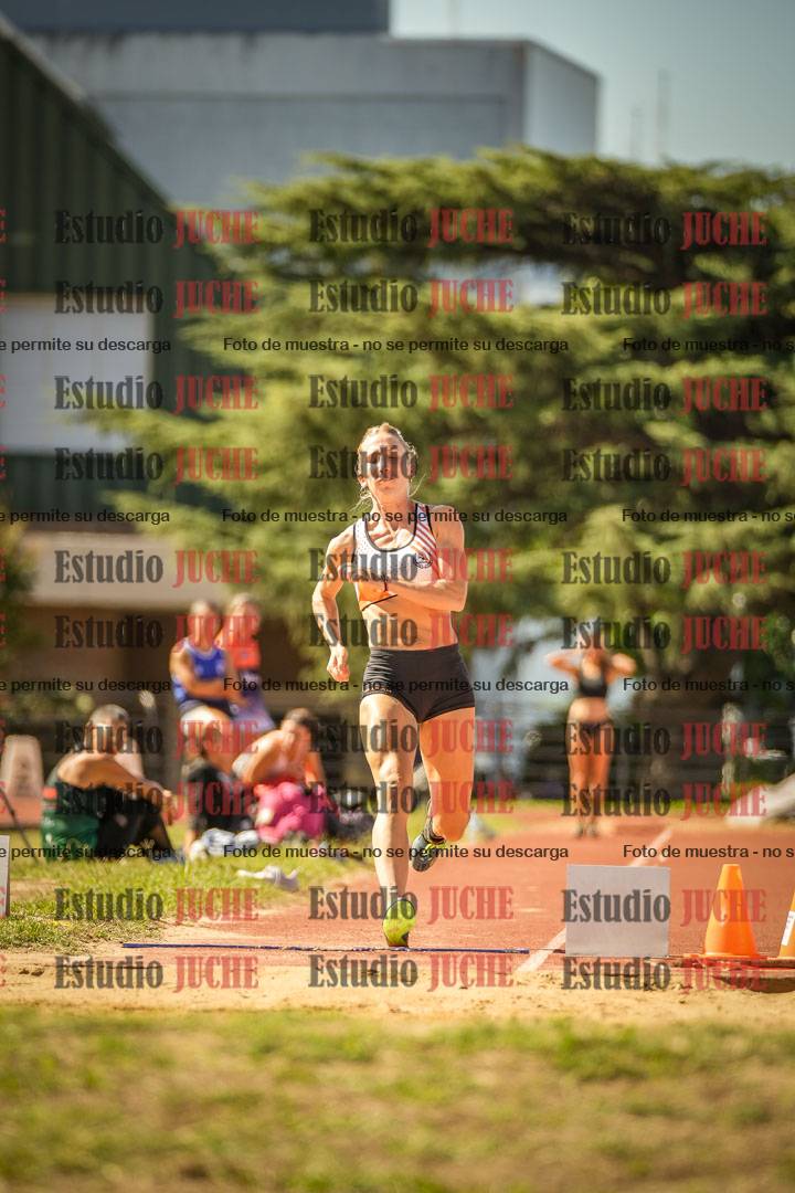 Fotos del salto en largo de mujeres