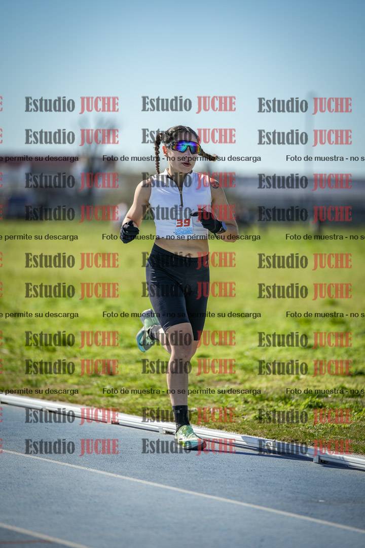 Fotos de los 5000 m llanos de mujeres y varones