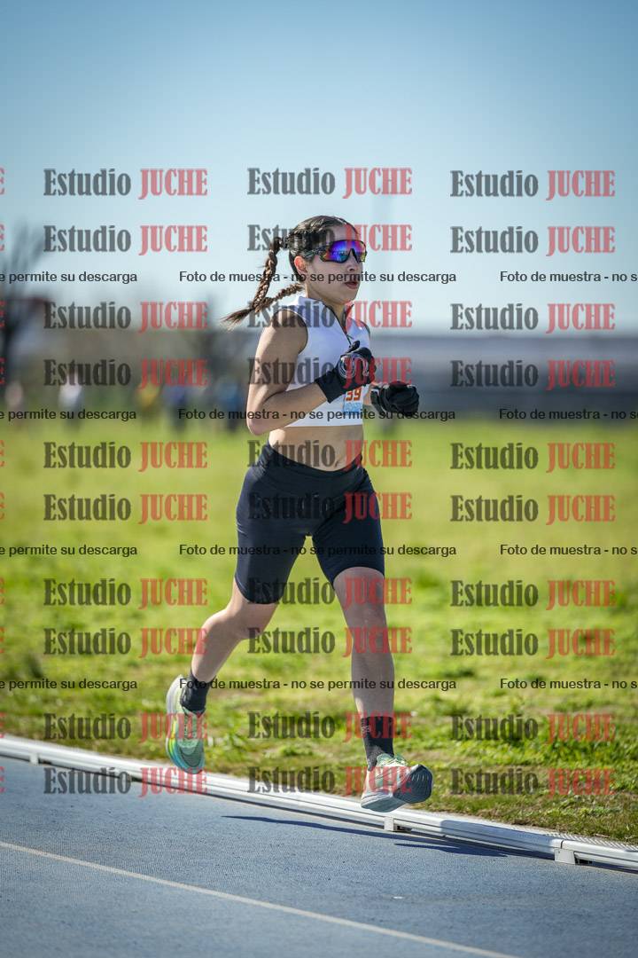 Fotos de los 5000 m llanos de mujeres y varones