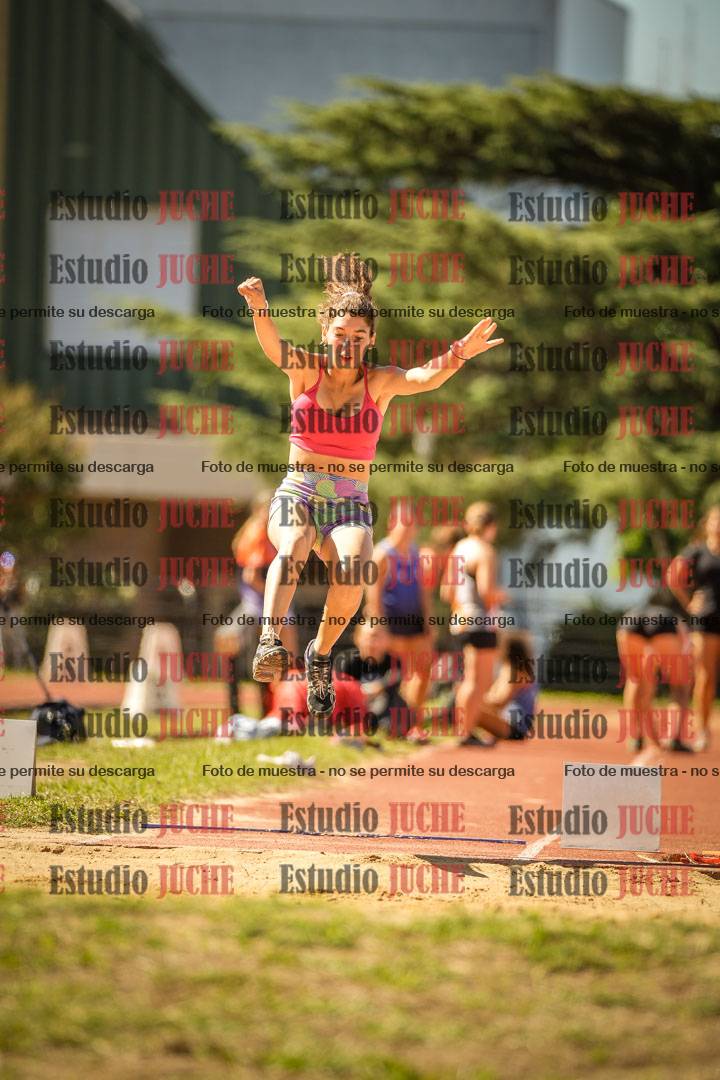 Fotos del salto en largo de mujeres