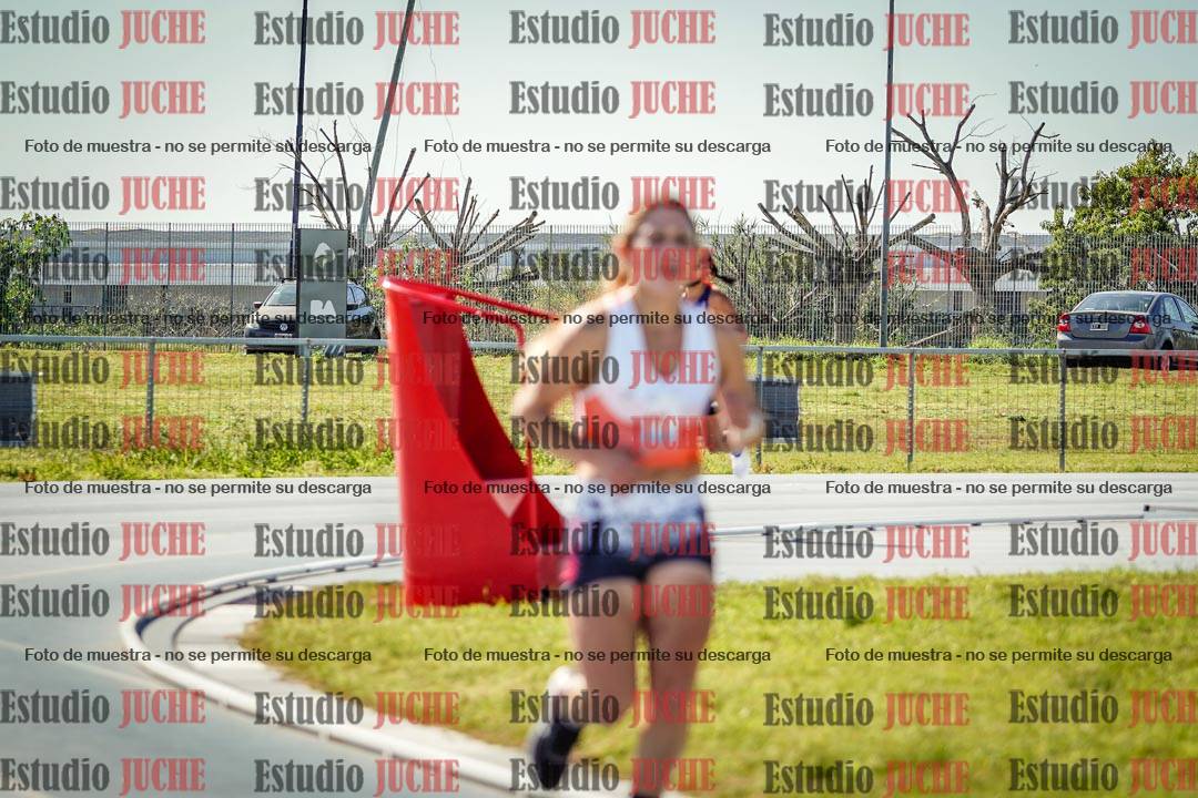 Fotos de los 5000 m llanos de mujeres y varones