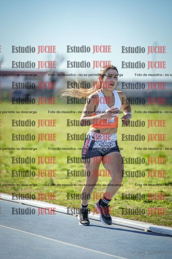 Fotos de los 5000 m llanos de mujeres y varones