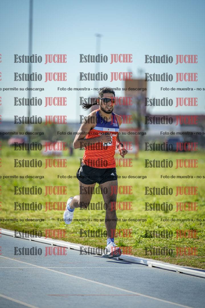 Fotos de los 5000 m llanos de mujeres y varones