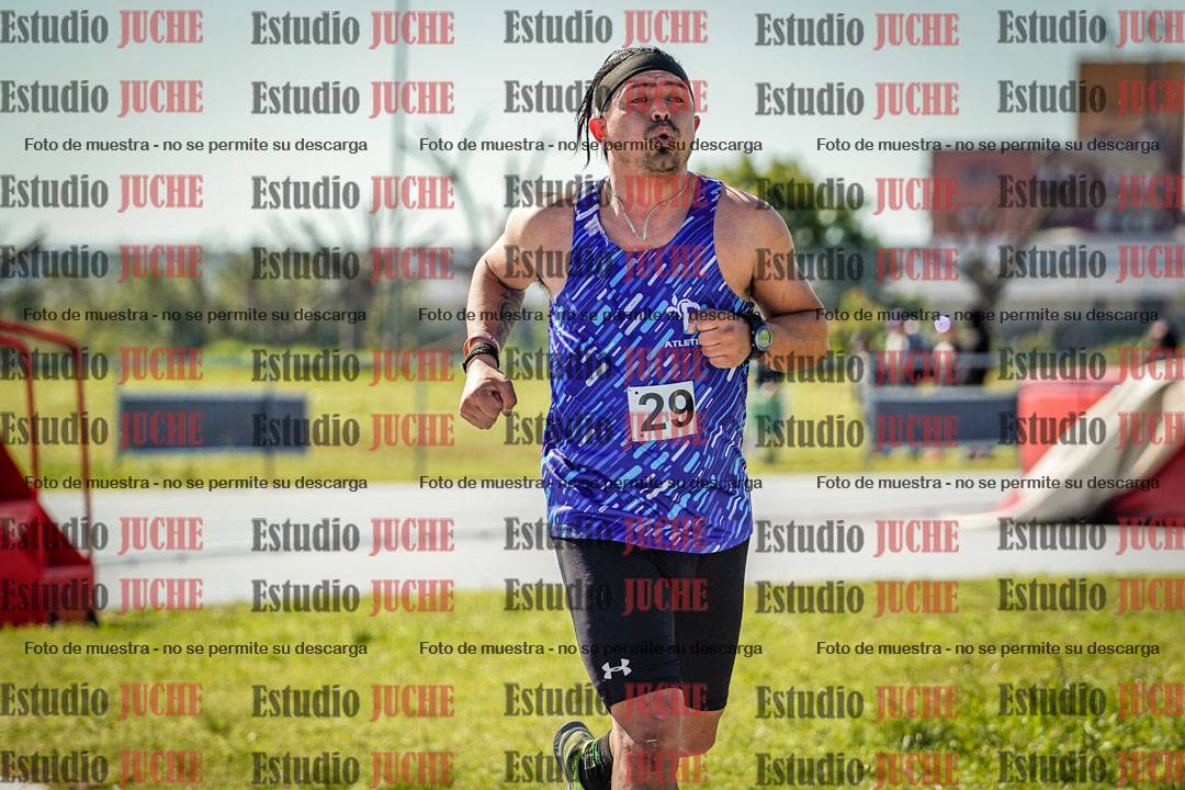 Fotos de los 5000 m llanos de mujeres y varones