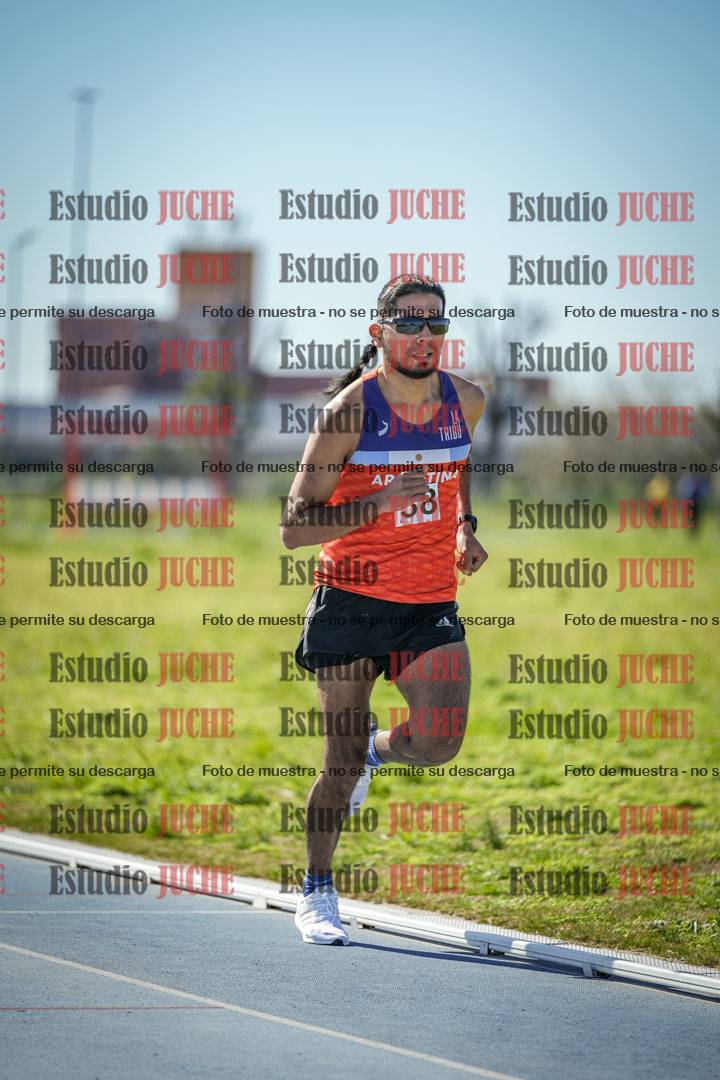 Fotos de los 5000 m llanos de mujeres y varones