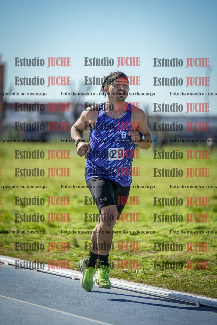 Fotos de los 5000 m llanos de mujeres y varones