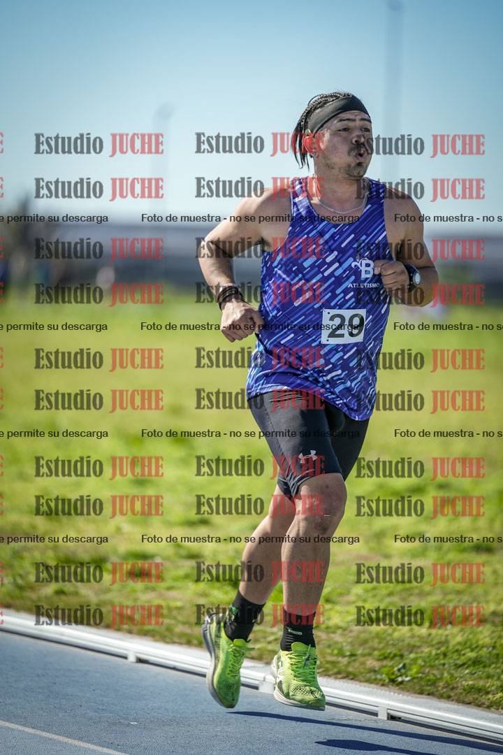 Fotos de los 5000 m llanos de mujeres y varones