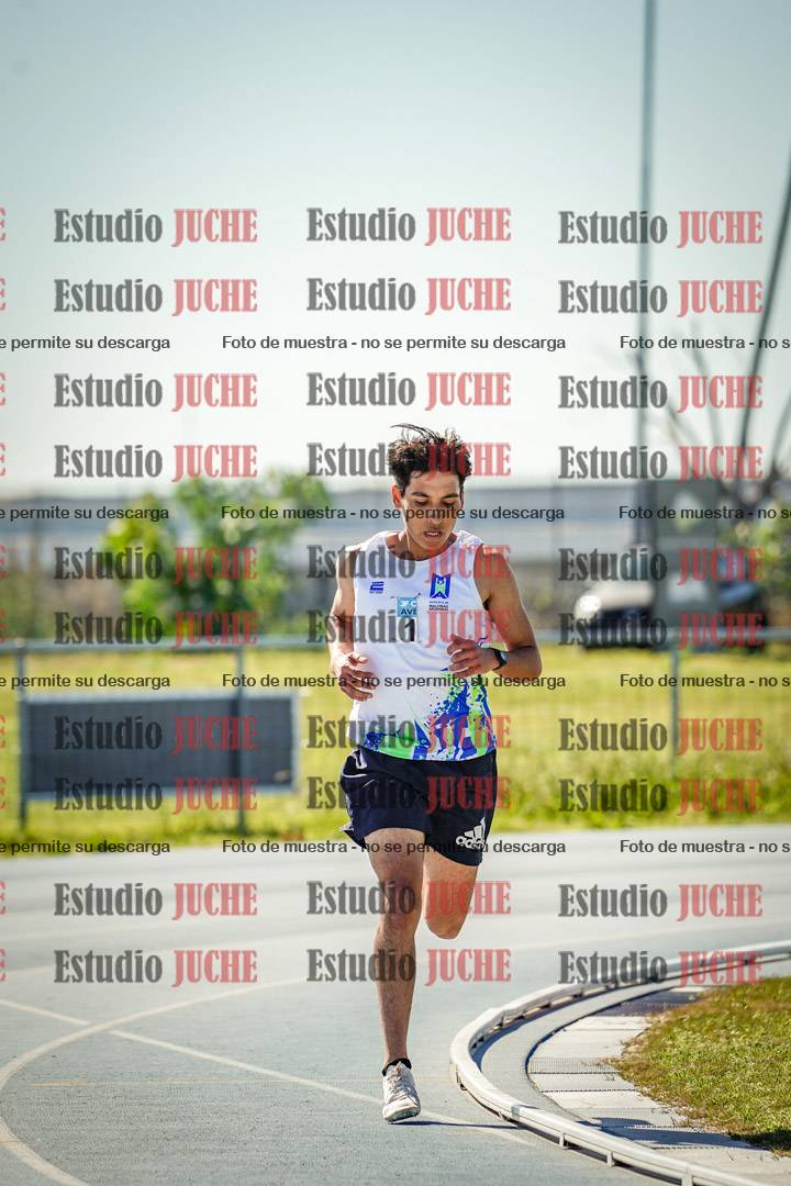 Fotos de los 5000 m llanos de mujeres y varones