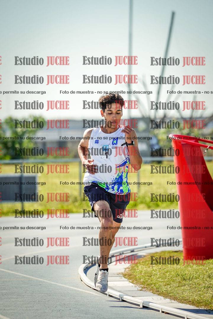 Fotos de los 5000 m llanos de mujeres y varones