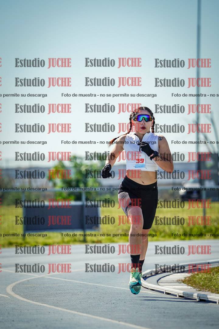 Fotos de los 5000 m llanos de mujeres y varones