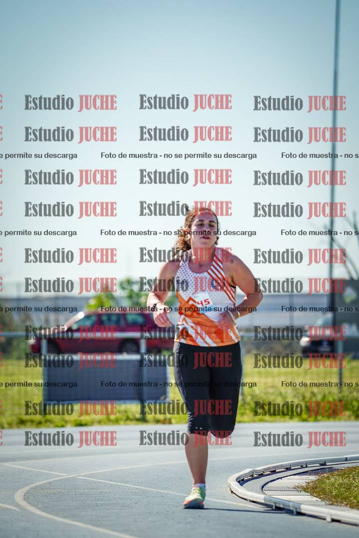 Fotos de los 5000 m llanos de mujeres y varones
