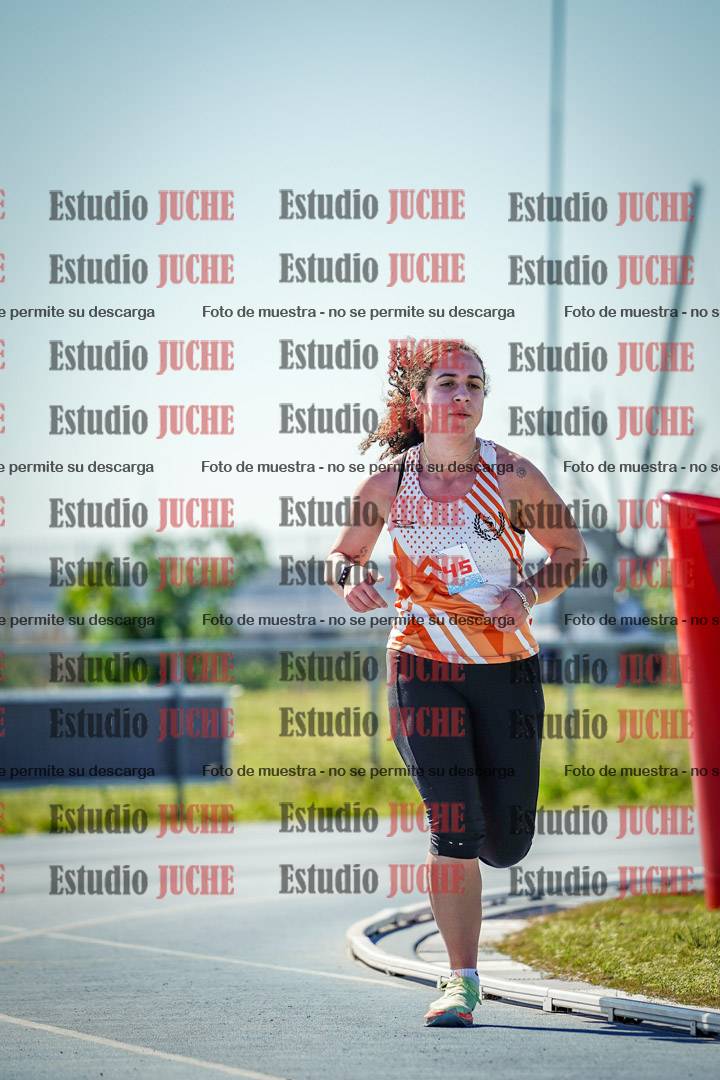 Fotos de los 5000 m llanos de mujeres y varones