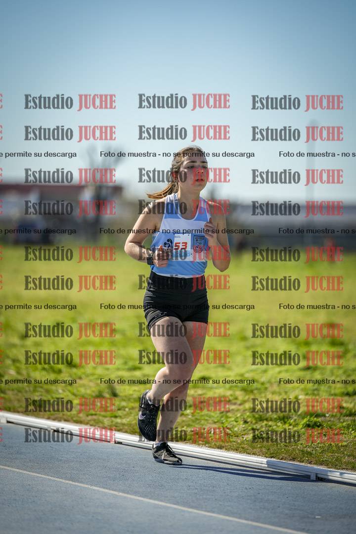 Fotos de los 5000 m llanos de mujeres y varones