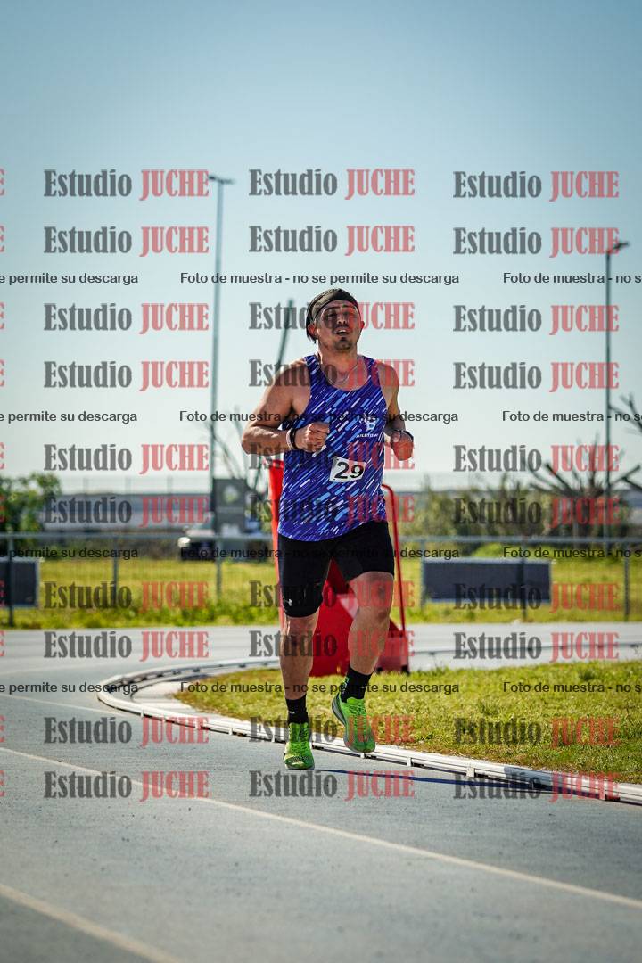 Fotos de los 5000 m llanos de mujeres y varones