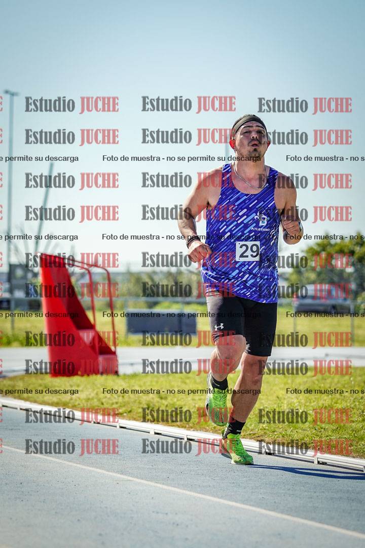 Fotos de los 5000 m llanos de mujeres y varones